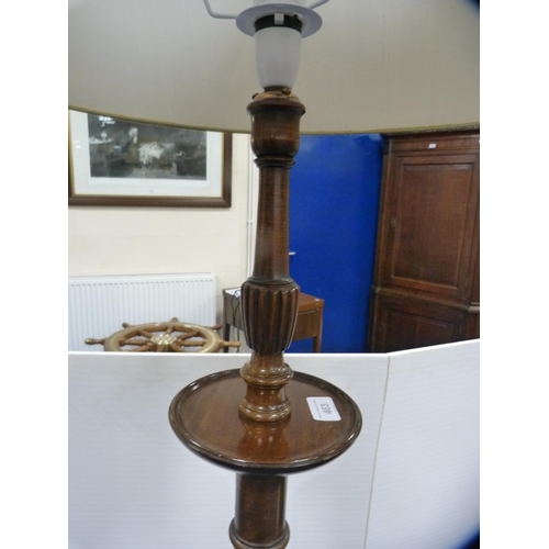 463 - Mahogany floor lamp with shade.