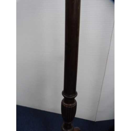 463 - Mahogany floor lamp with shade.