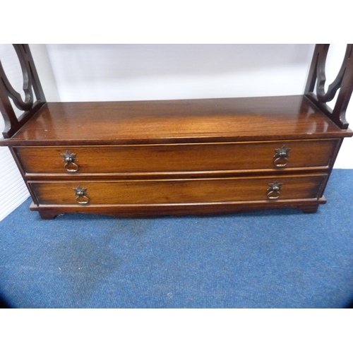 466 - Reproduction mahogany hanging wall shelf with two drawers below.