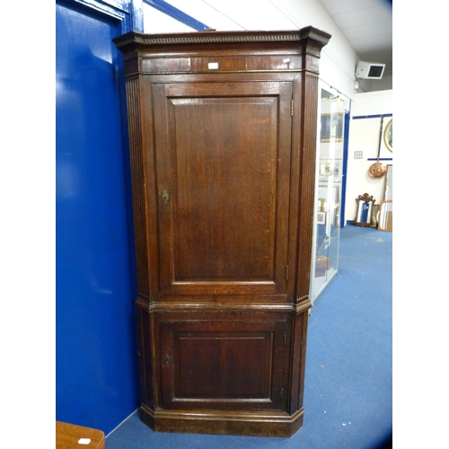 469 - Antique oak double corner cupboard with later ply backing.