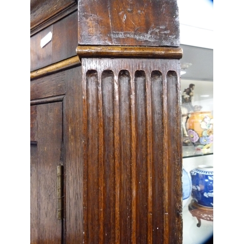 469 - Antique oak double corner cupboard with later ply backing.