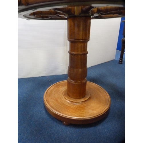 471 - Ship's wheel coffee table with brass mounts.