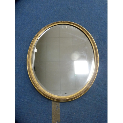 49 - Rectangular wall mirror, an oval gilt mirror and a teak-framed mirror.  (3)