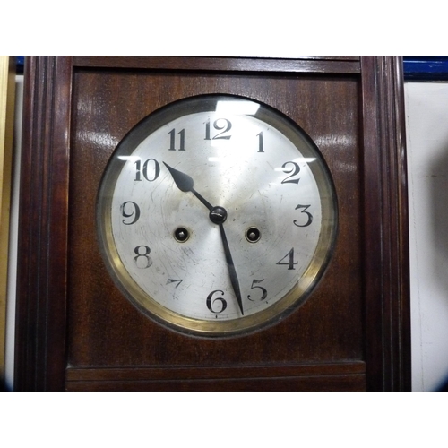 57 - Oak-cased wall clock.