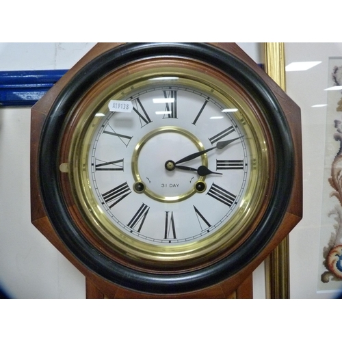 58 - Reproduction thirty-one day regulator wall clock.