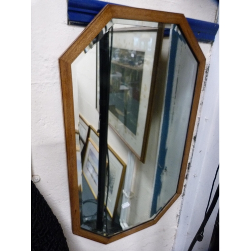 68 - Inlaid mahogany octagonal wall mirror and a pencil signed print of a church interior.