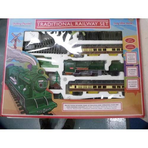 79 - Battery operated boxed traditional railway set.