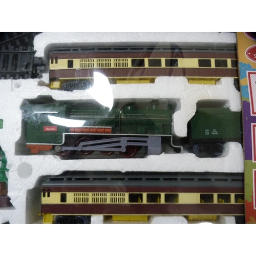 79 - Battery operated boxed traditional railway set.