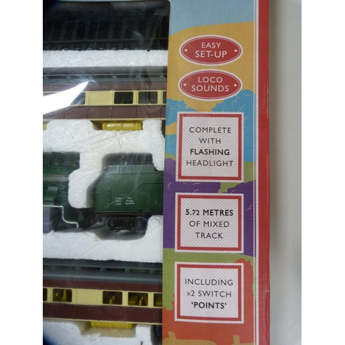 79 - Battery operated boxed traditional railway set.