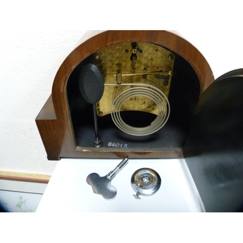 81 - Walnut-cased mantel clock.