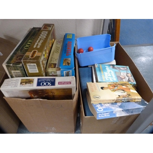 83A - Box of assorted jigsaw puzzles and a carton of general books, Stanley Gibbons stamp album etc.