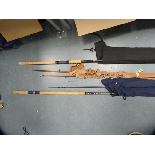 87 - Three fishing rods to include Bruce & Walker Norway 16ft, Hardy 10ft 6in glass fibre etc.