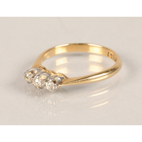 44 - Ladies 18 ct gold three stone diamond ring.ring size m/n