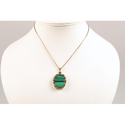 52 - 9ct gold mounted malachite pendant on a 9 ct gold chain.total weight 10.3 grams