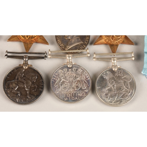 54 - Various WW1 and WW2 medals to include a Territorial Medal for Efficient Service awarded to Corporal ... 