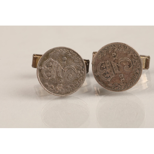 65 - Pair of threepence cufflinks