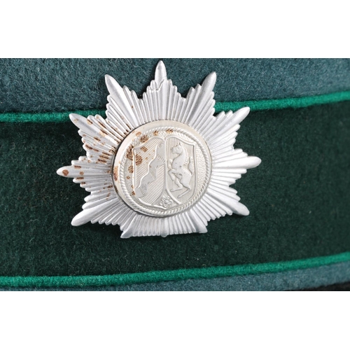 838 - German Police cap with North Rhine Westphalia coat of arms cap badge, the interior with label for Al... 