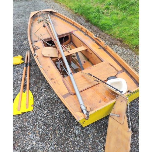 590 - Vintage 16' Mirror type sailing dinghy of leaf form and of marine ply and teak construction. With sa... 