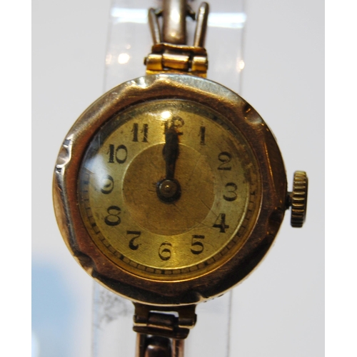 139 - Lady's 9ct gold backed wristwatch, engraved and dated 1929 to the back casing, on flexible rolled go... 