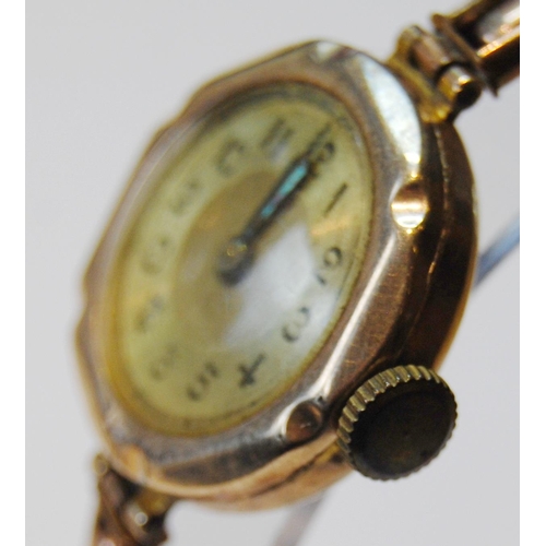 139 - Lady's 9ct gold backed wristwatch, engraved and dated 1929 to the back casing, on flexible rolled go... 