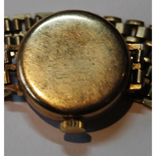 139 - Lady's 9ct gold backed wristwatch, engraved and dated 1929 to the back casing, on flexible rolled go... 