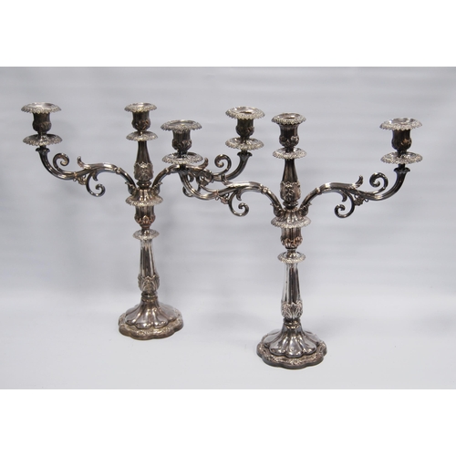 29 - Pair of antique silver plated candelabra, each with twin scroll branches, sconce to the top and cent... 