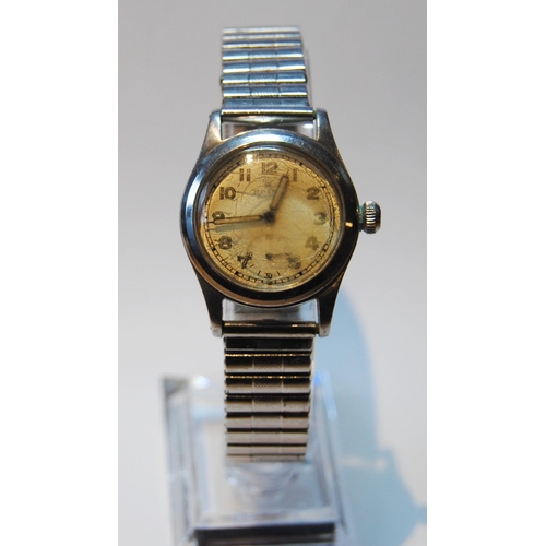 140 - Rolex Oyster wristwatch, c. 1930s, in stainless steel case with oatmeal dial, Arabic numerals and se... 