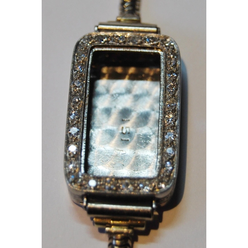 142 - Art Deco 9ct white gold and diamond lady's cocktail wristwatch set with small brilliant-cut diamonds... 