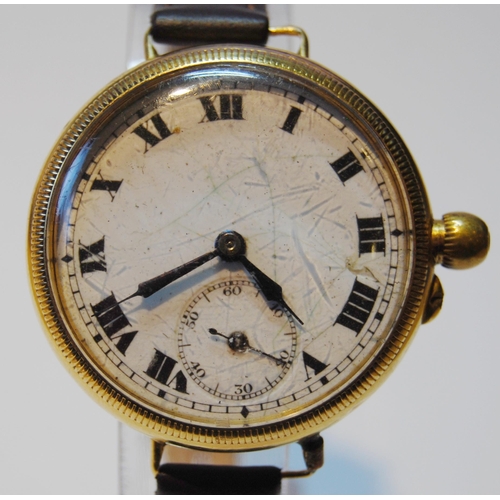 143 - 9ct gold backed wristwatch, c. 1920s, with white enamel dial, Roman numerals and seconds dial, case ... 