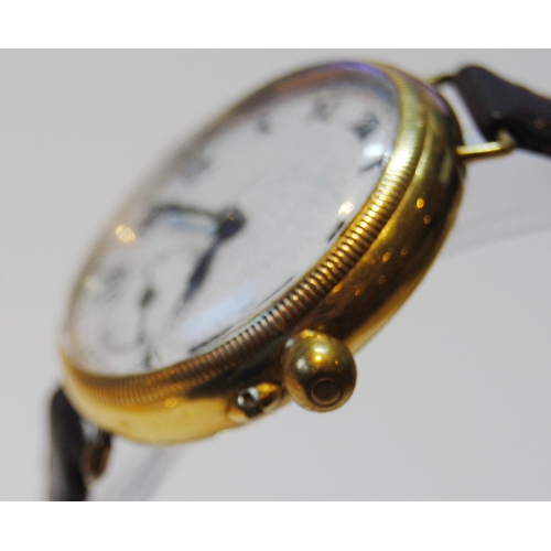 143 - 9ct gold backed wristwatch, c. 1920s, with white enamel dial, Roman numerals and seconds dial, case ... 