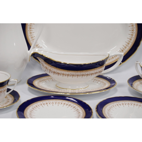 209 - Royal Worcester 'Regency' pattern cobalt blue tea, coffee and dinner set comprising two tureens, ova... 