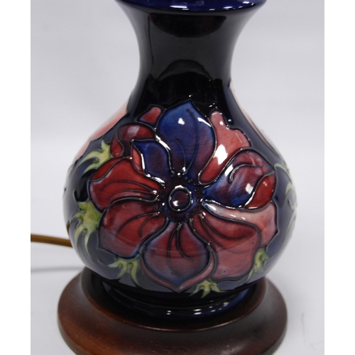 222 - Moorcroft 'Anemone' table lamp with tube lined decoration on a blue ground, fixed to base, 16cm high... 