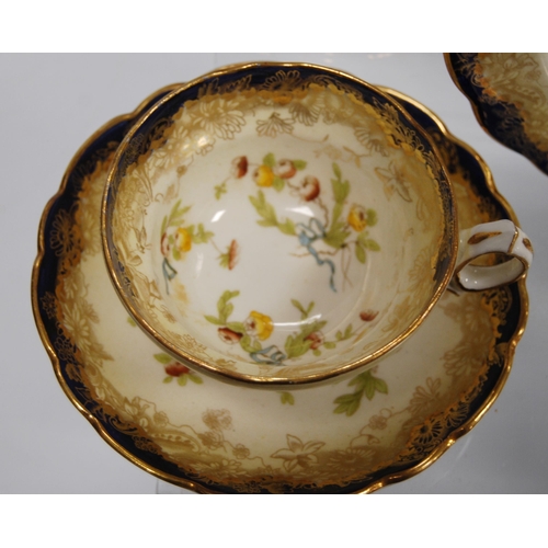 225 - Hammersley twelve-setting china tea service, c. early 20th century, decorated with sprays of berries... 