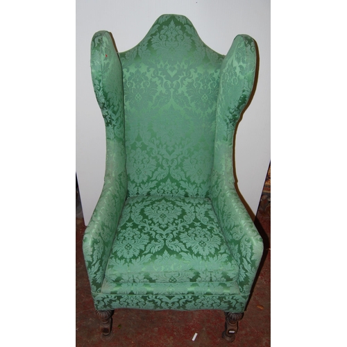 424 - William & Mary-style wing armchair upholstered in later green floral damask, on turned supports ... 