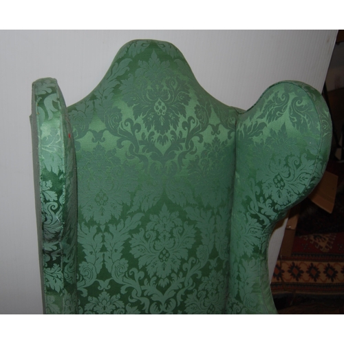 424 - William & Mary-style wing armchair upholstered in later green floral damask, on turned supports ... 