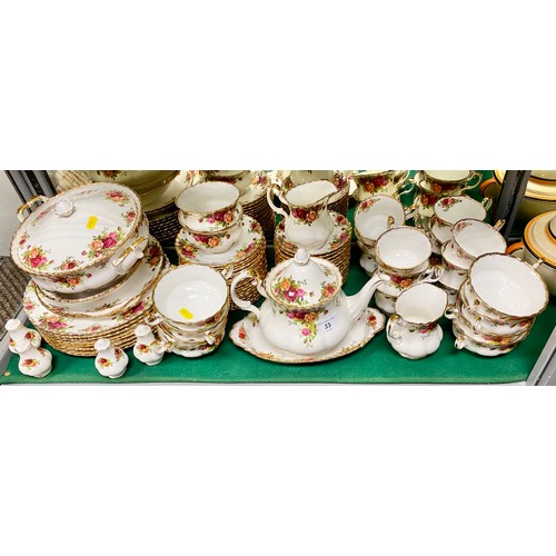 33 - Royal Albert Country Roses dinner set, including tea pot, eight soup bowls, twelve tea cups and sauc... 