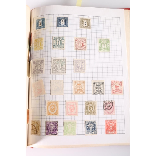 464 - Stamp collection held across three albums, mostly 20th century material including GB, JAPAN, USA, et... 