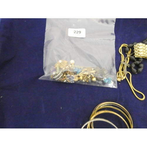 229 - Large bag of costume jewellery