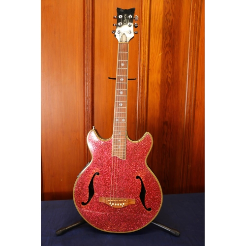 Daisy Rock electric six string guitar with red glitter design