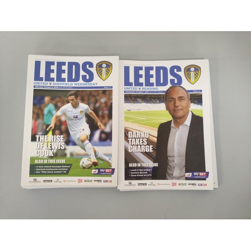 307 - Carton containing a large collection of Leeds United football programmes mostly dating from the 1990... 