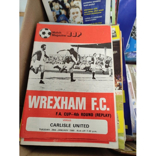 311 - Carton containing a large collection of mostly 1970s-90s Carlisle United football programmes and oth... 