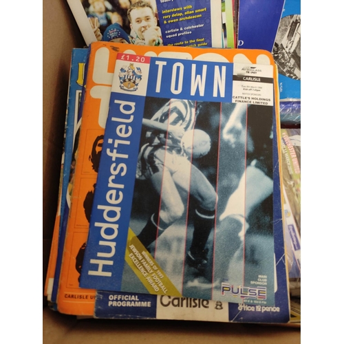 311 - Carton containing a large collection of mostly 1970s-90s Carlisle United football programmes and oth... 