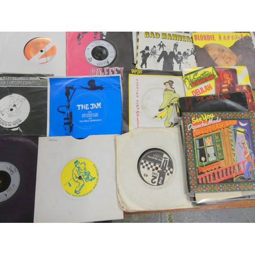 426 - Box of single records including Two Tone, Punk, 80's etc.