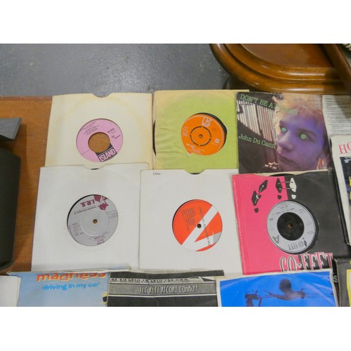 426 - Box of single records including Two Tone, Punk, 80's etc.