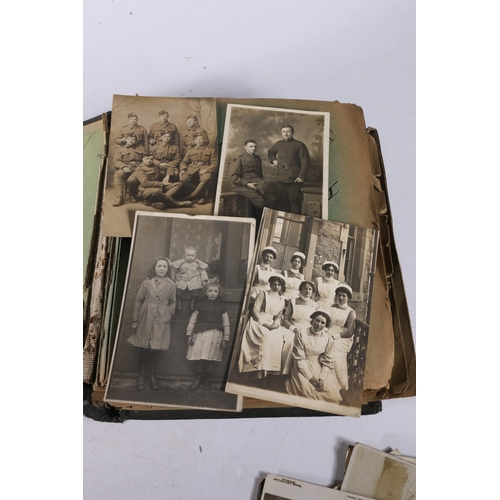 422 - Early 20th century photograph and postcard album containing approximately 180 cards including HMY Vi... 