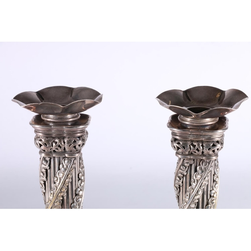 740 - Masonic interest, a pair of Catspaw Patent silver-plated candlesticks in the form of the Apprentice ... 