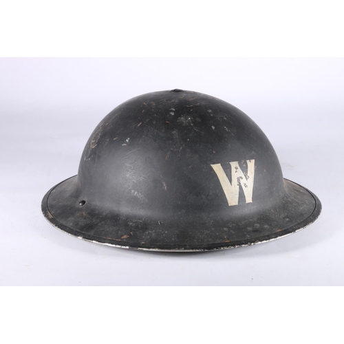 841 - British WWII Warden's helmet, the interior stamped 'R.O.Co UP 1/1939', painted marks 'W' with black ... 