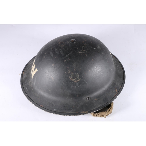 841 - British WWII Warden's helmet, the interior stamped 'R.O.Co UP 1/1939', painted marks 'W' with black ... 