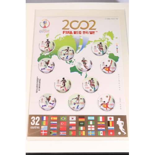 495 - Westminster Mint The 2002 World Cup Collection of stamps held across three albums with certificate o... 