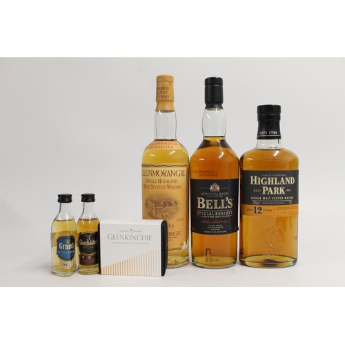 340 - Three bottles of single malt Scotch whisky to include GLENMORANGIE 10 year old , stills label verso,... 